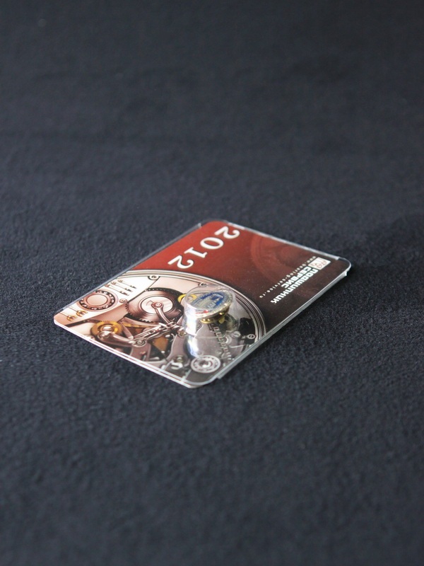 Блистер с загибом краев под значок и календарик