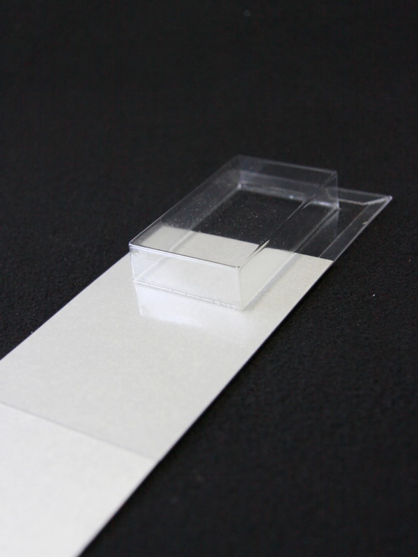 Блистер с загибом краев под изделие 39х70х13 мм