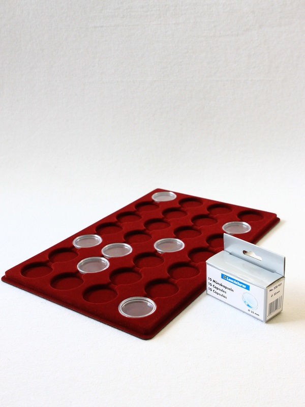 Планшет L (222х333х13 мм) для 28 монет в капсулах CAPS 33 Leuchtturm. Диаметр ячейки 39 мм Планшет L (222х333х13 мм) для 28 монет в капсулах CAPS 33 Leuchtturm. Диаметр ячейки 39 мм