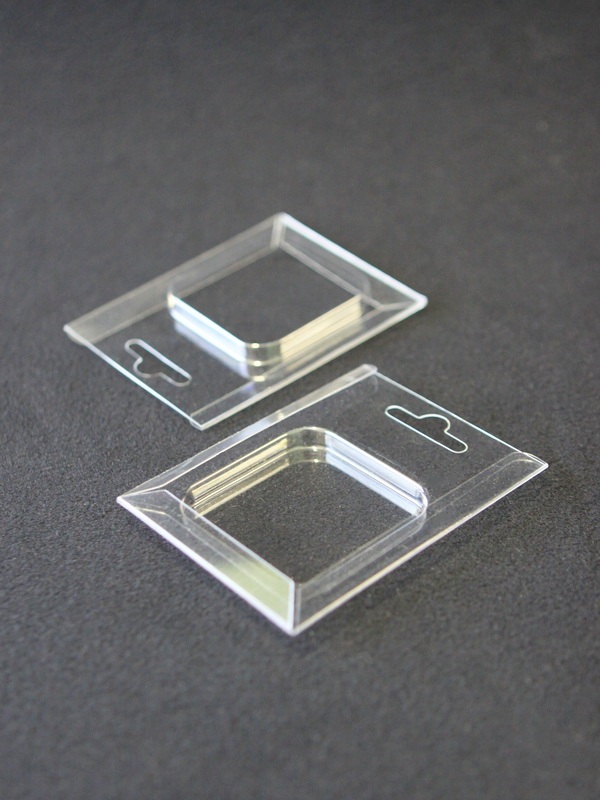 Блистер с загибом краев для капсул d-50 мм