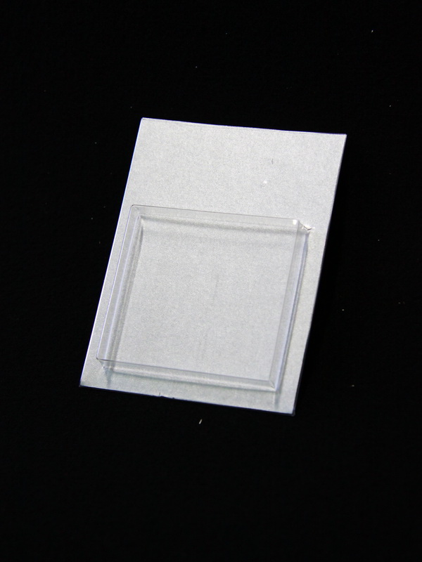 Блистер с загибом краев под изделие 53х57х9 мм