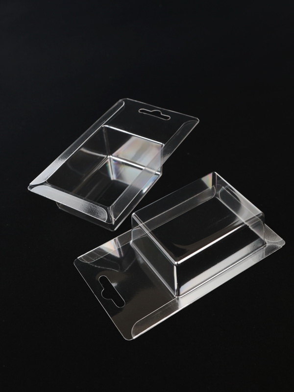 Блистер с загибом краев под изделие 56х74х32 мм. Тип 11