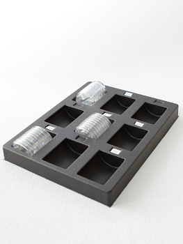 Пластиковый ложемент под набор капсул для монет