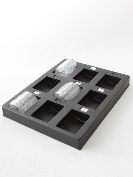 Пластиковый ложемент под набор капсул для монет