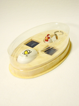 Сувенирная упаковка овальной формы под подарочный набор