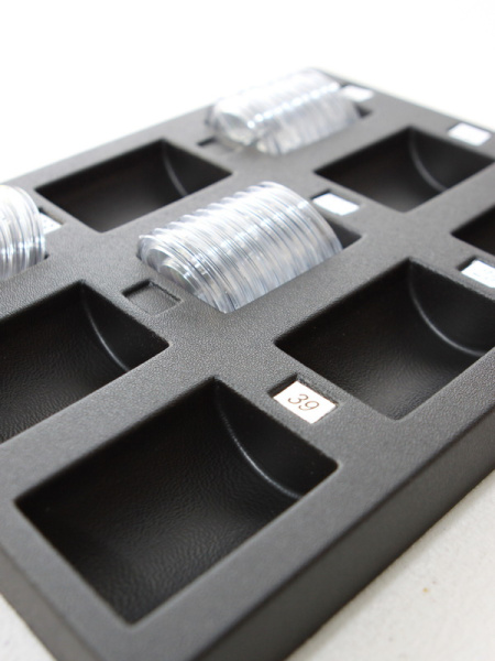 Пластиковый ложемент под набор капсул для монет