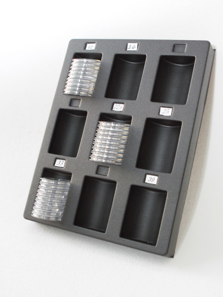 Пластиковый ложемент под набор капсул для монет