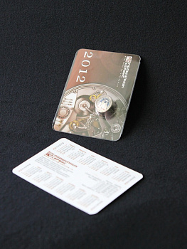 Блистер с загибом краев под значок и календарик