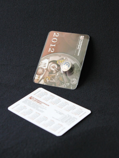 Блистер с загибом краев под значок и календарик