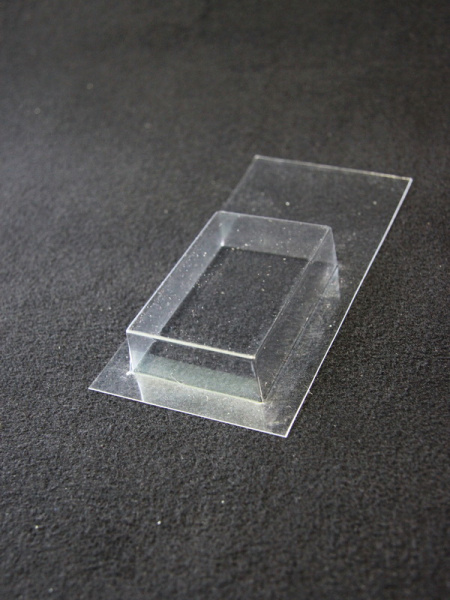 Блистер с загибом краев под изделие 49х75х18 мм