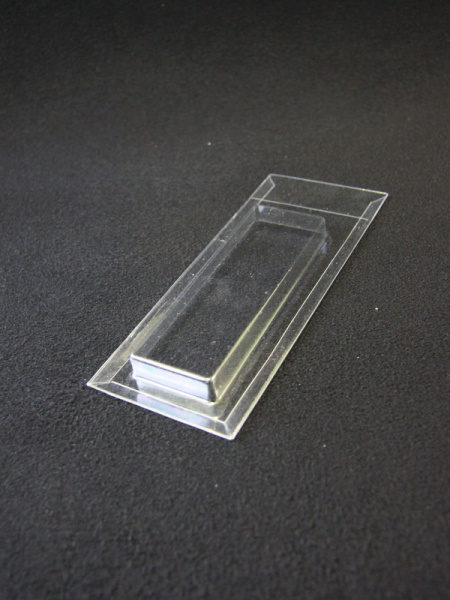 Блистер с загибом краев под изделие 40х120х12 мм