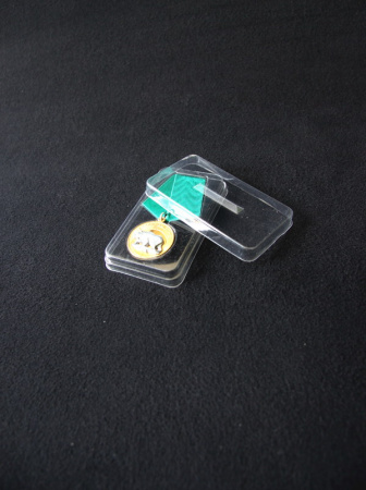 Сувенирная упаковка (57х99х19 мм) под медаль РФ d-32 мм (прозрачная)
