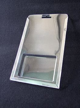 Блистер с загибом краев под изделие 70х106х15 мм