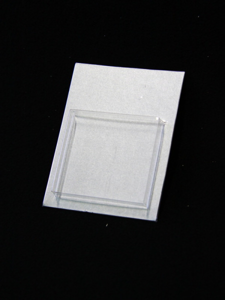 Блистер с загибом краев под изделие 53х57х9 мм