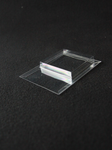 Блистер с загибом краев под изделие 53х57х9 мм