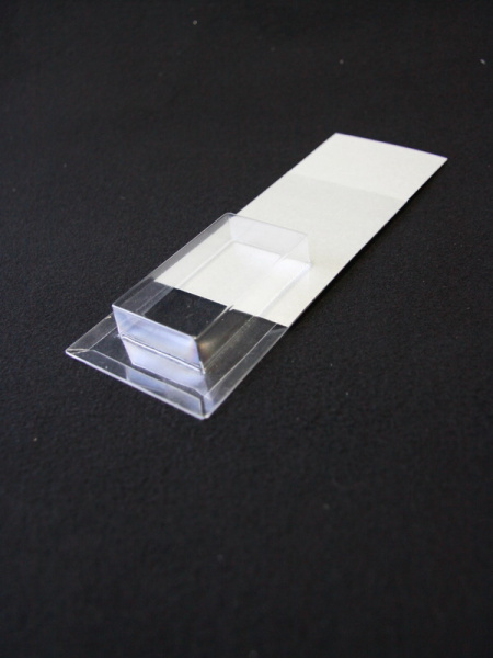 Блистер с загибом краев под изделие 39х70х13 мм