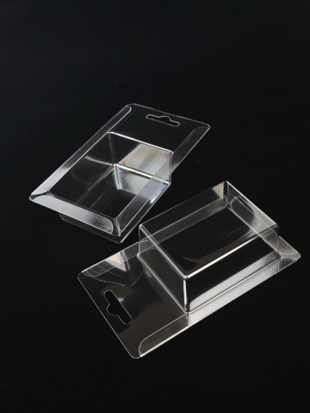 Блистер с загибом краев под изделие 56х74х32 мм. Тип 11