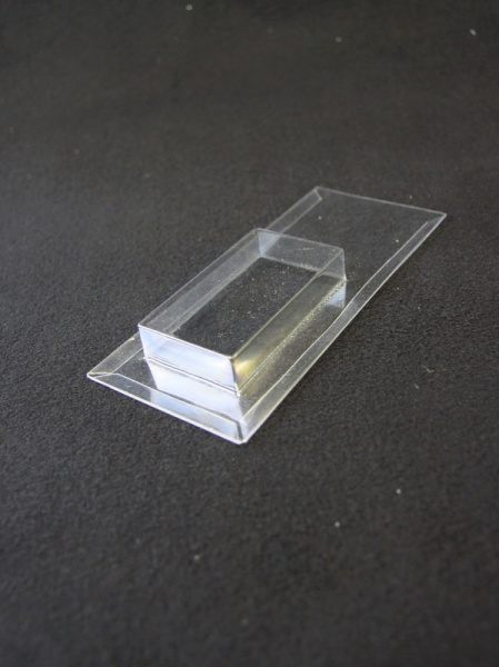 Блистер с загибом краев под изделие 39х70х13 мм